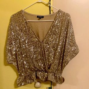 Women’s gold sequin bat wing top